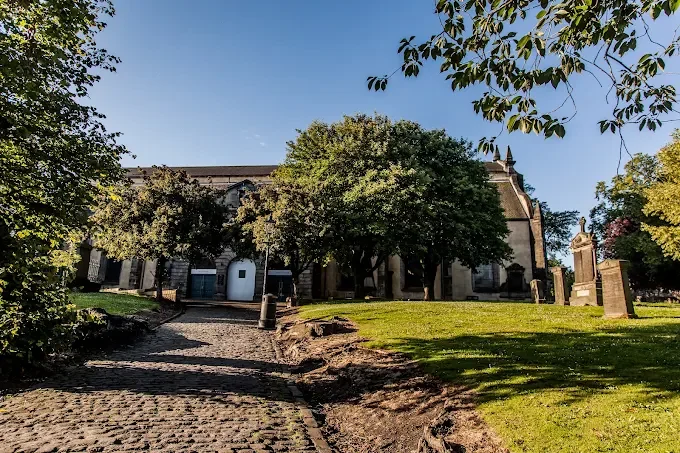 Greyfriars Kirkyard in Edinburgh, Scotland, with historic gravestones and the Black Mausoleum